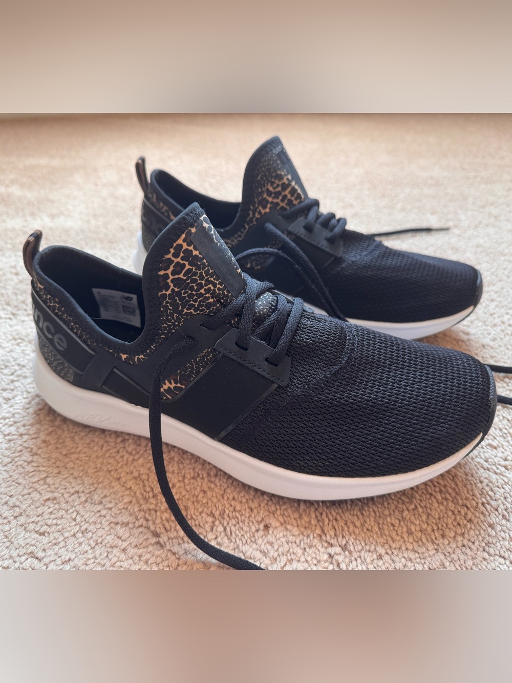 New Balance Black Sneakers with Leopard Accent